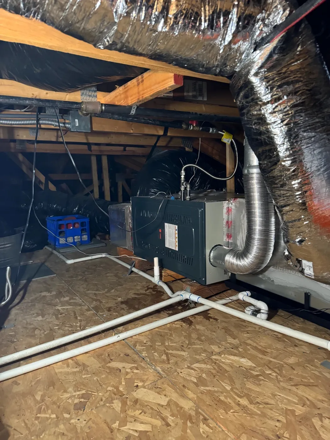 Attic furnace with new flex and hard pipe duct runs installed by CrossBreeze